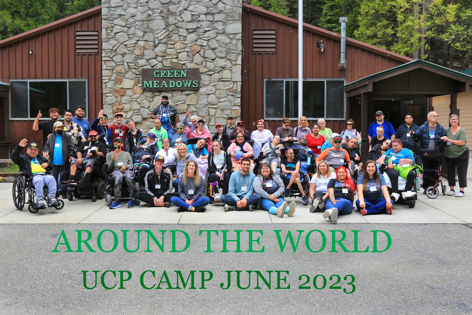Camp Mountain High 2023 attendees pose in front of Green Meadows building.