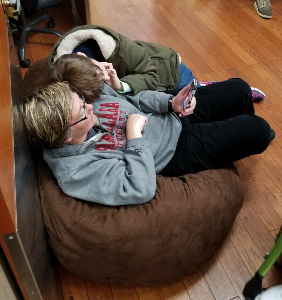 Cunningham and a student share a quiet moment.